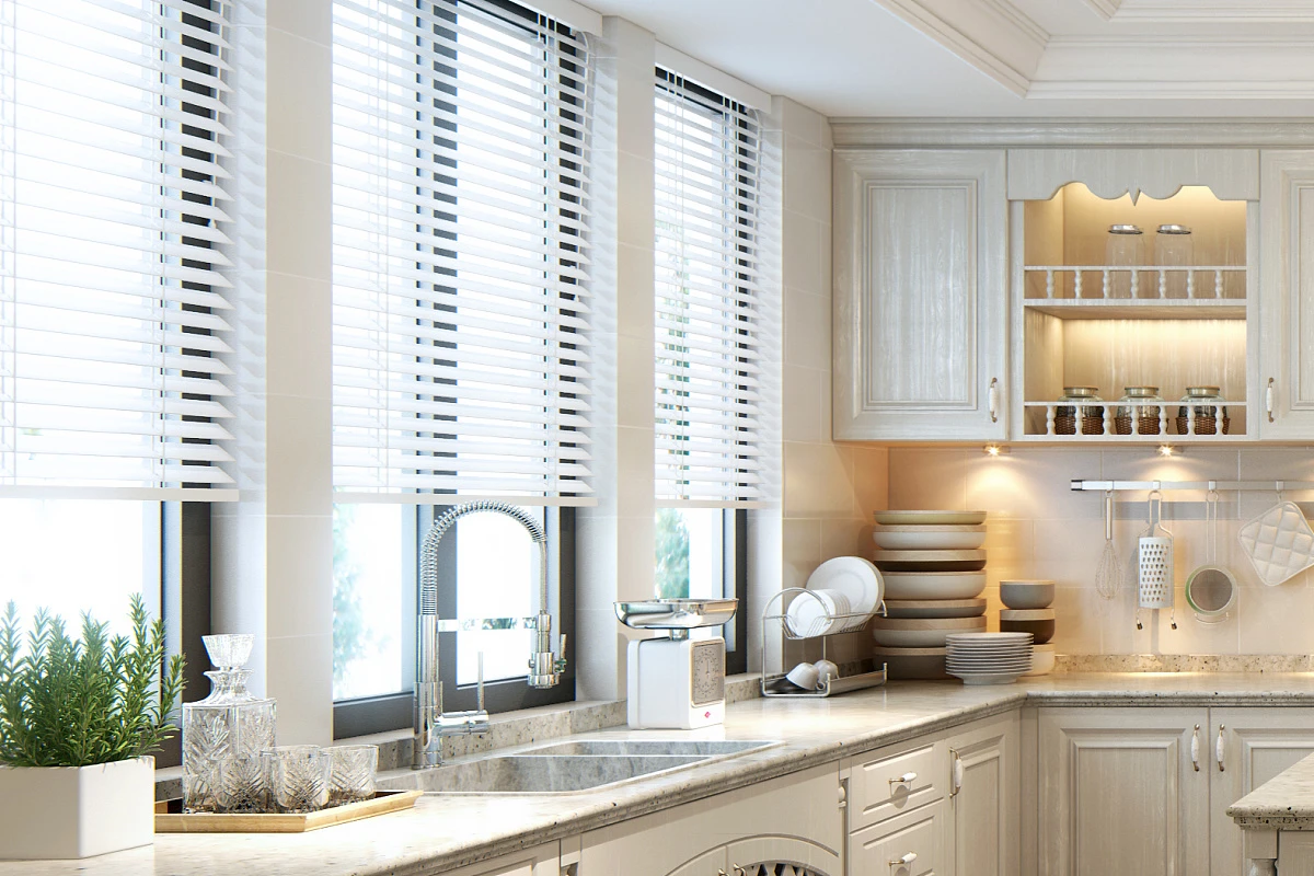 Faux wood blinds on the window next to the kitchen sink